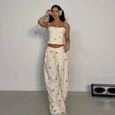 Conjunto Feminino Casual Primavera 2026: Camisola Estampada com Recortes Laterais e Alças Finas e Calça Pantalona - Moda Boho Elegante