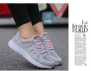 Mulheres sapatos casuais moda respirável andando malha sapatos planos tênis feminino 2021 ginásio sapatos vulcanizados branco calçado feminino