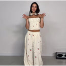 Conjunto Feminino Casual Primavera 2026: Camisola Estampada com Recortes Laterais e Alças Finas e Calça Pantalona - Moda Boho Elegante